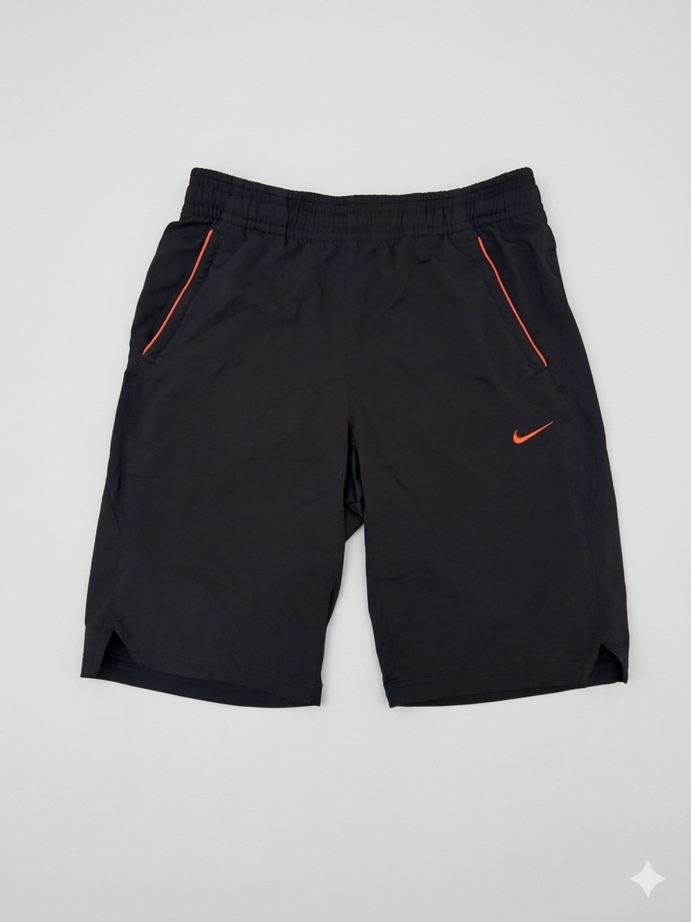 Nike Men's Black Athletic Shorts with Orange Trim